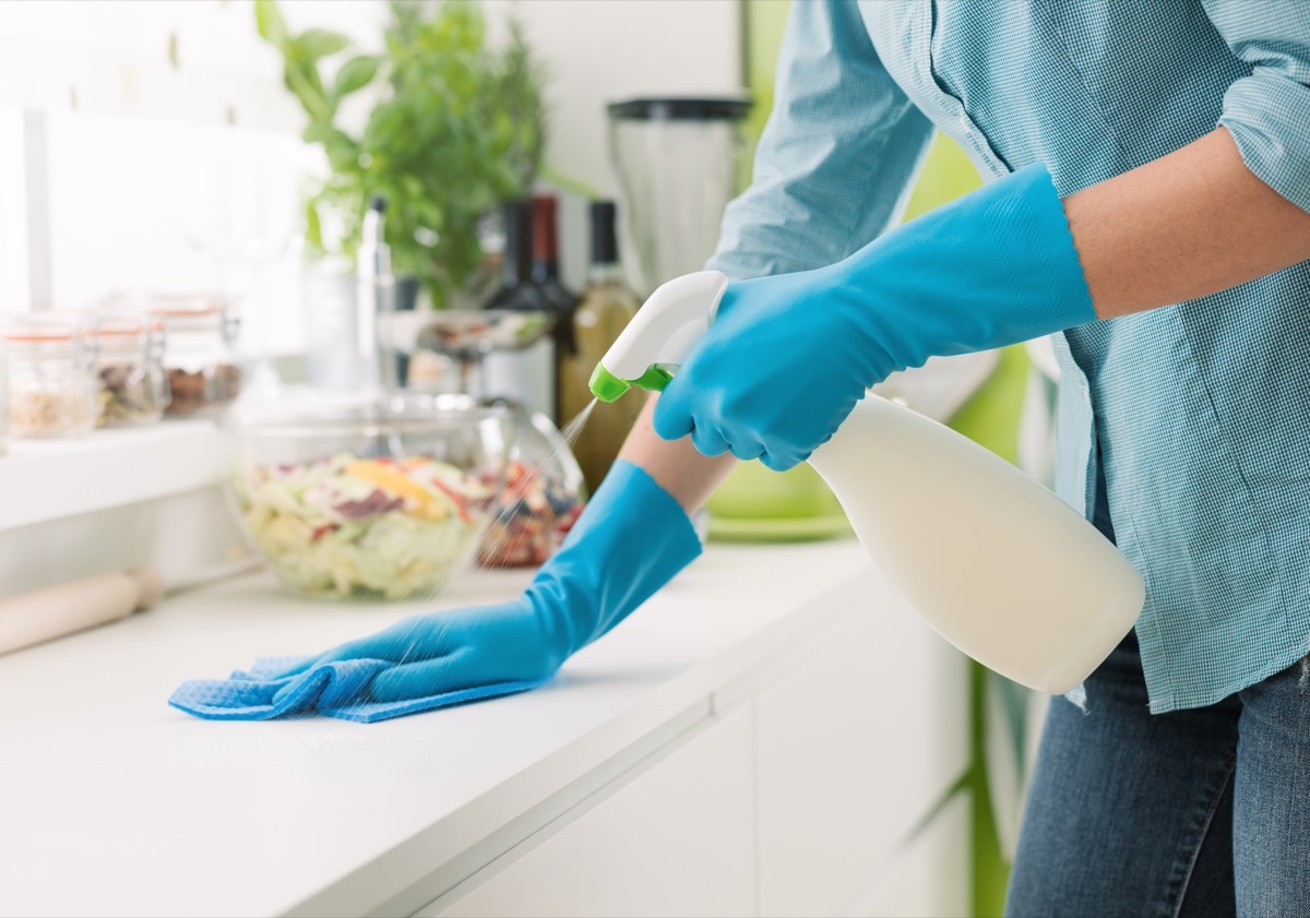 Woman cleaning the kitchen