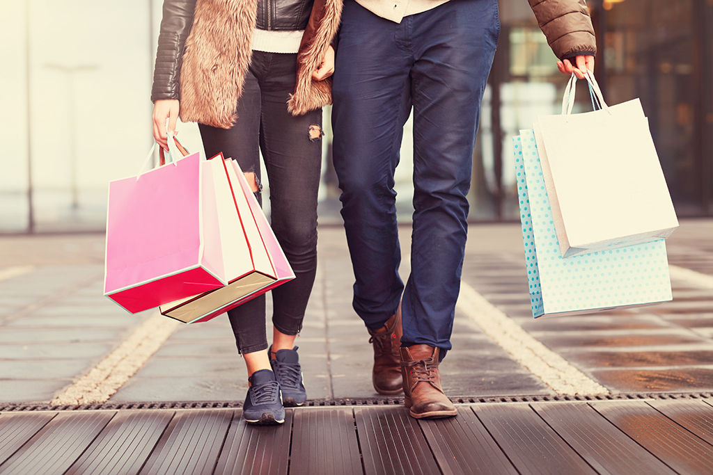 couple with a lot of shopping bags