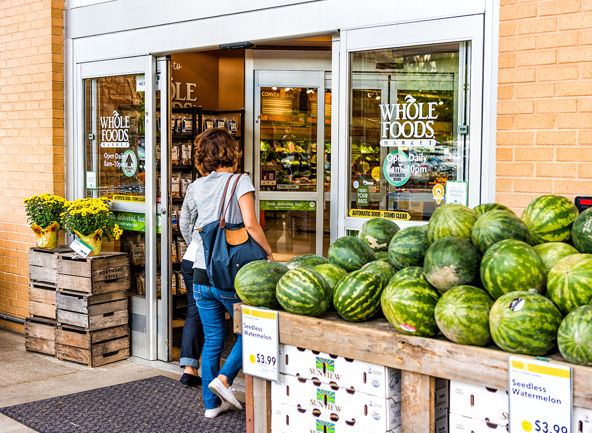 doors to whole foods with watermelons for sale