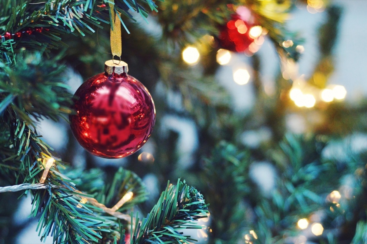 fake christmas tree with red ornaments