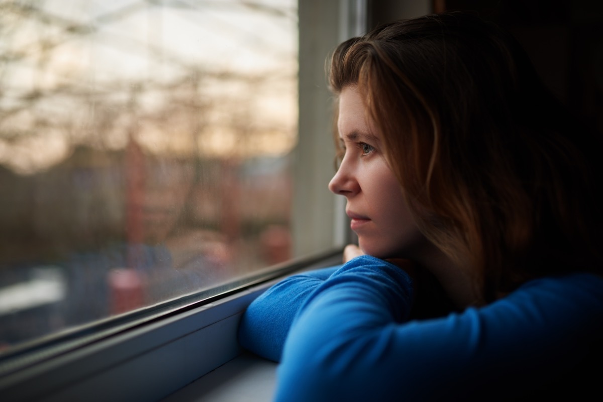 Woman Staring Out the Window