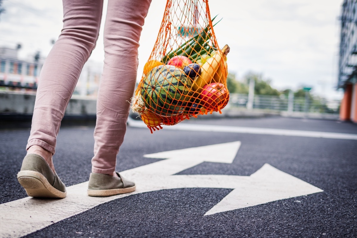 woman walking in parking lot