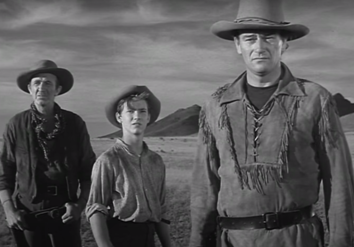 Walter Brennan, Mickey Kuhn, and John Wayne in 