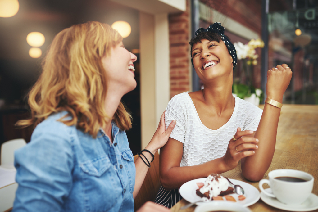 Friends Laughing at Cafe Anti-Aging