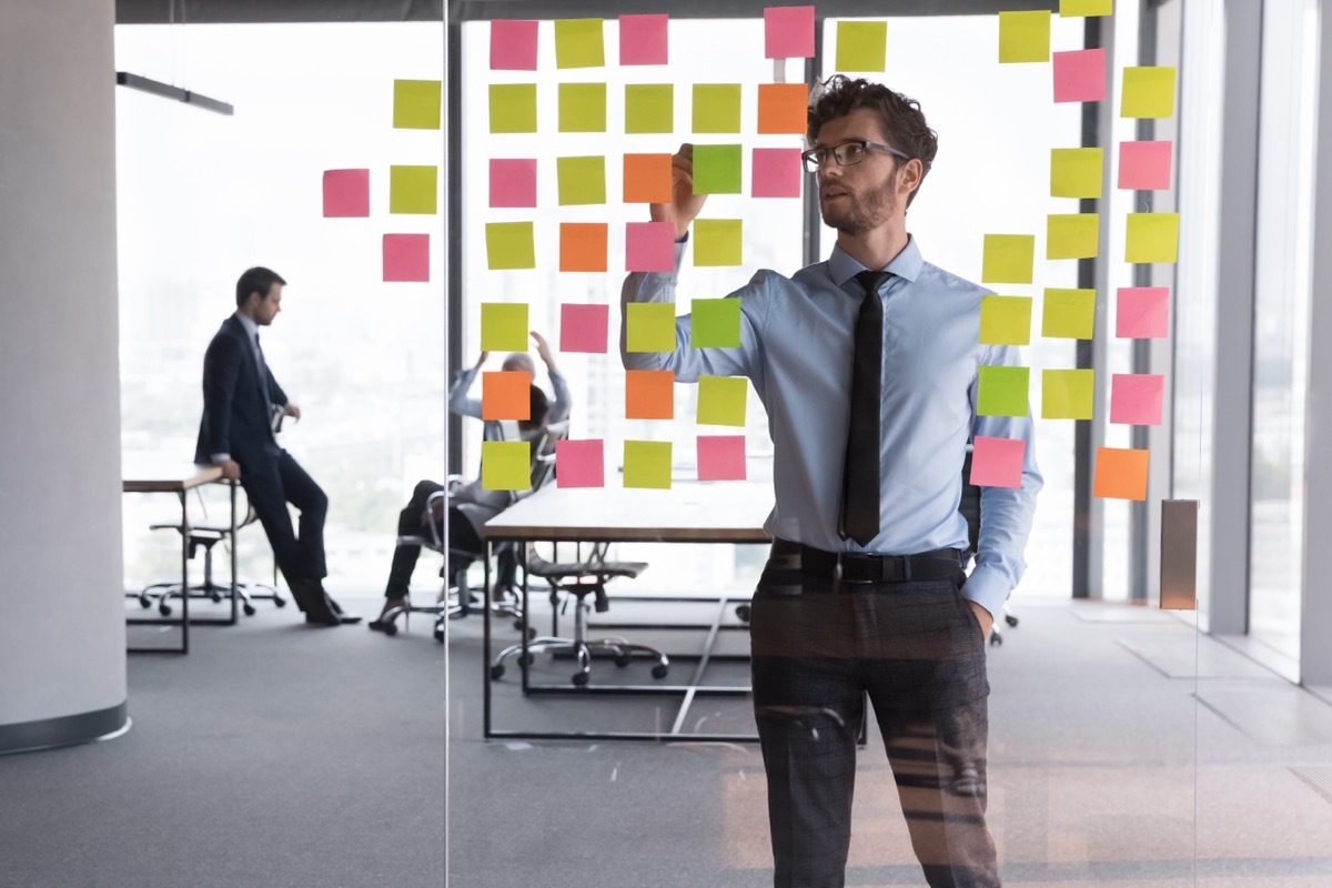 Man with Organized Post-Its