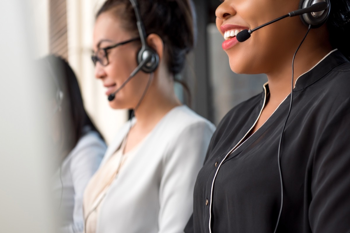 row of telemarketers sitting up straight and smiling, telemarketer secrets