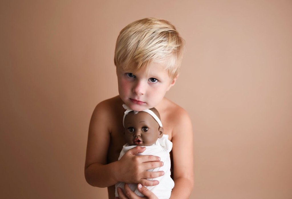 little boy baby doll photoshoot