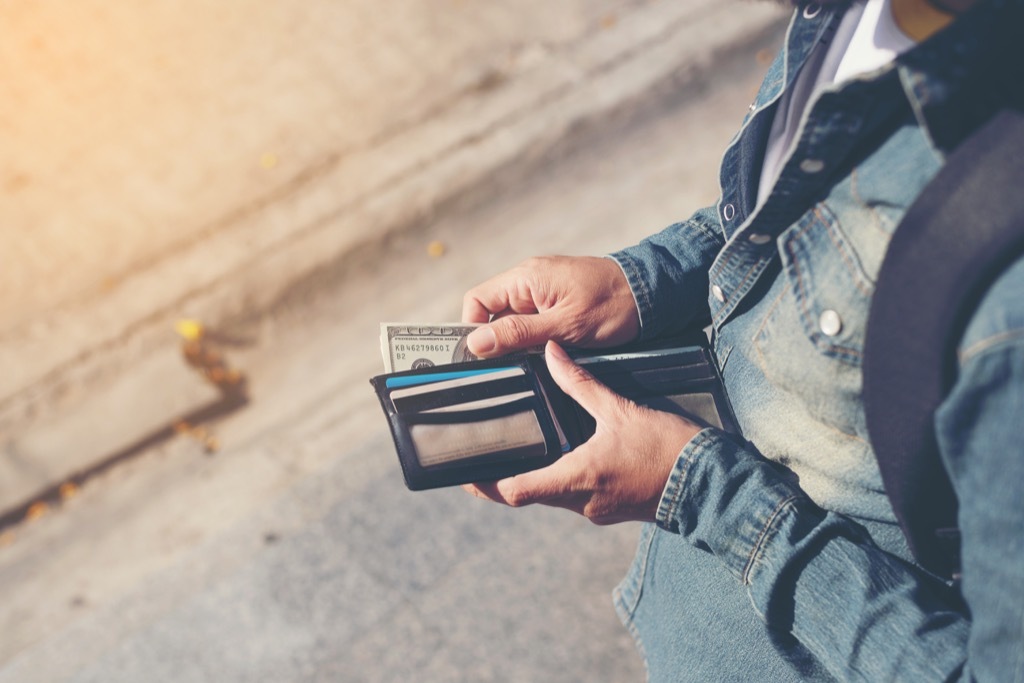 Man Organizing Wallet