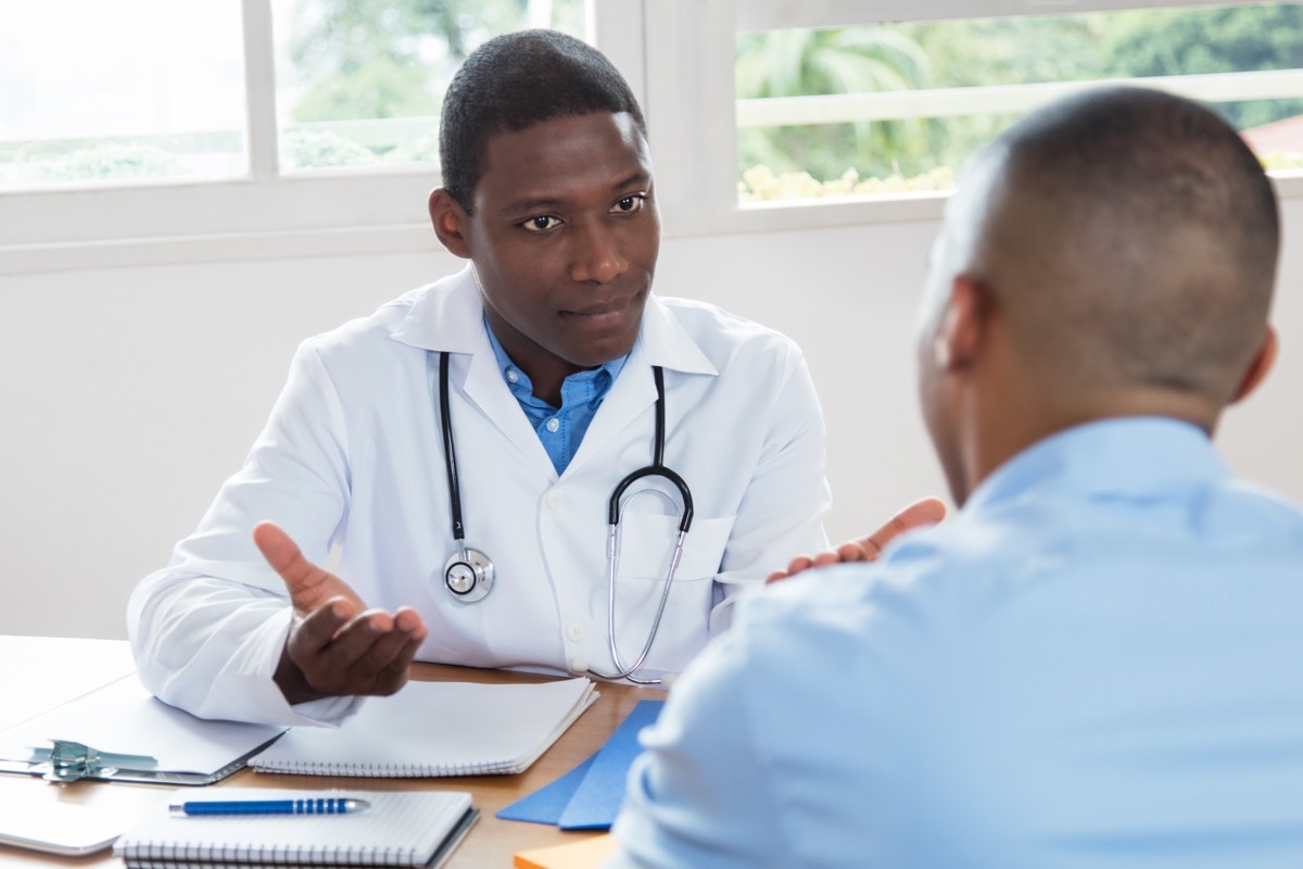 Doctor talking to patient