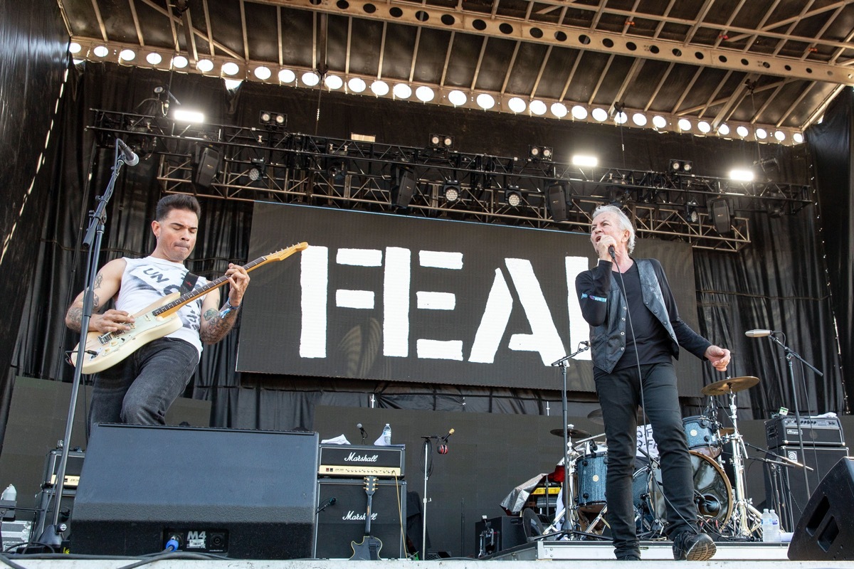 lee ving performing with punk band fear on stage