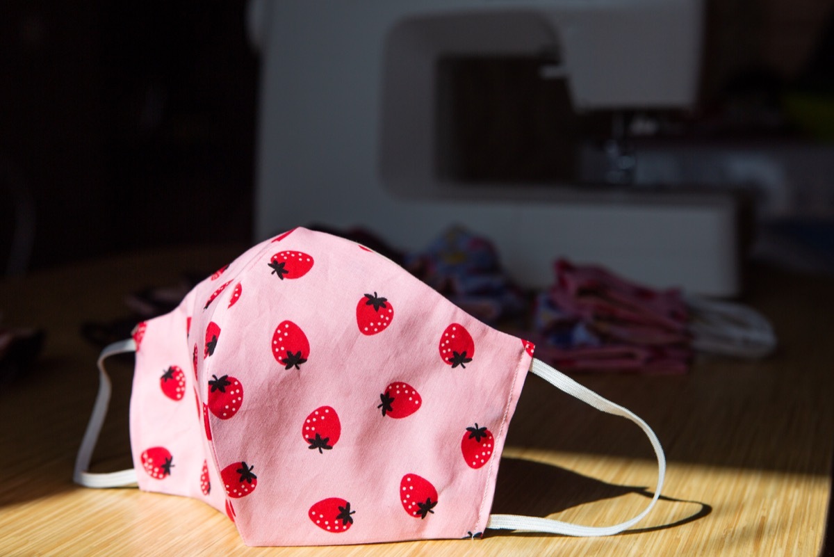 Fabric mask on the background of a sewing machine