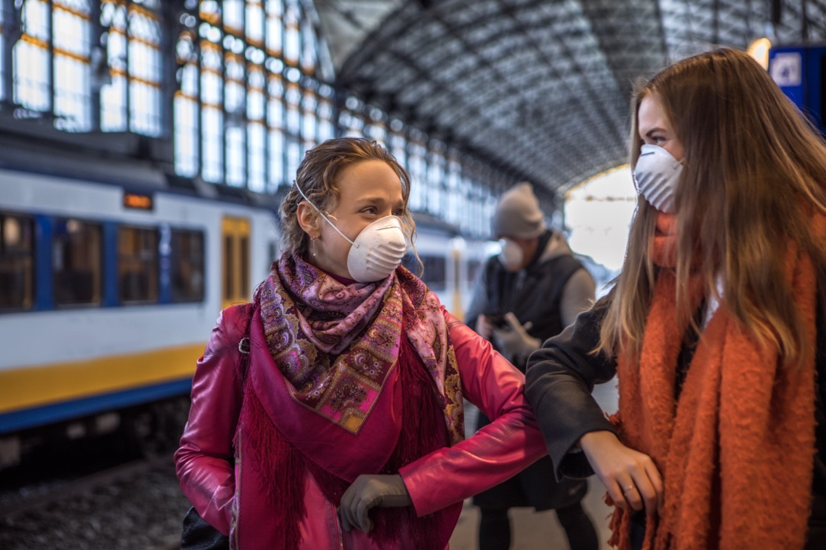 Friends meeting in public during virus outbreak