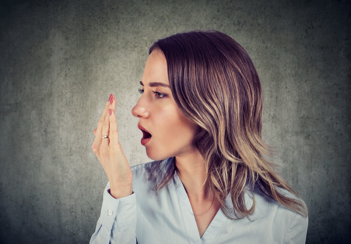 woman checking her breath