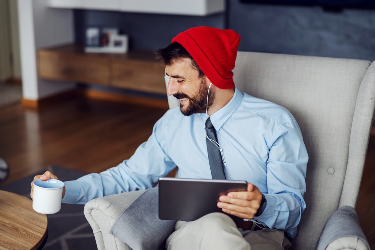 White man working from home with coffee