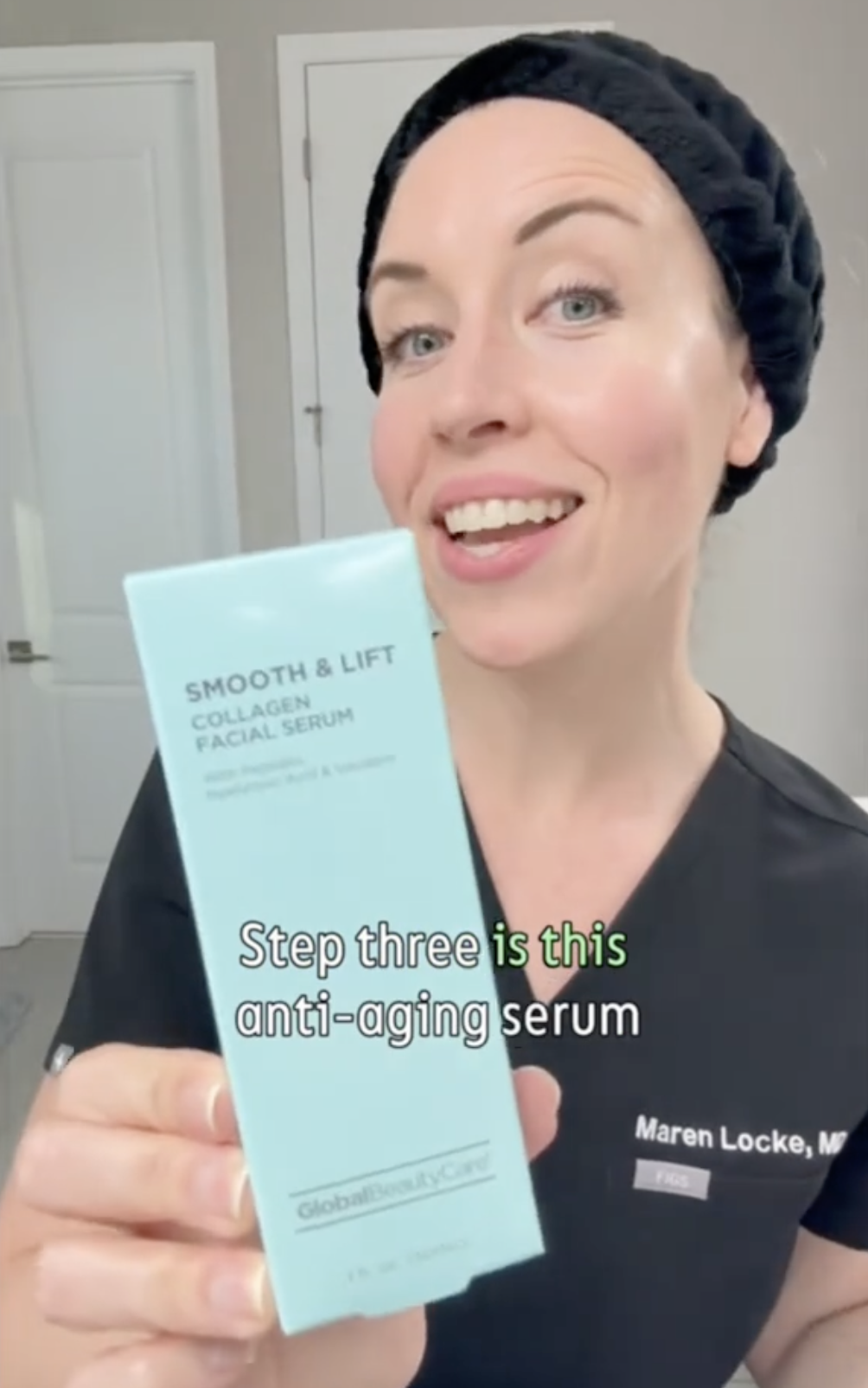 Dermatologist Maren Locke holds up a skincare product from Dollar Tree