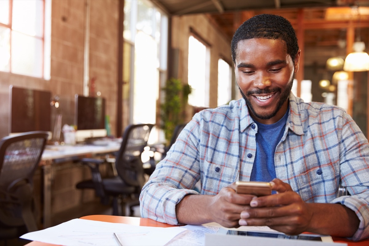 man on phone ignoring other people