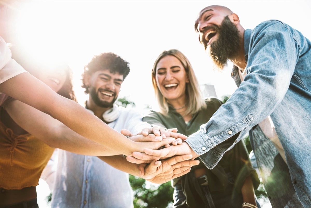 Group of People with Hands in