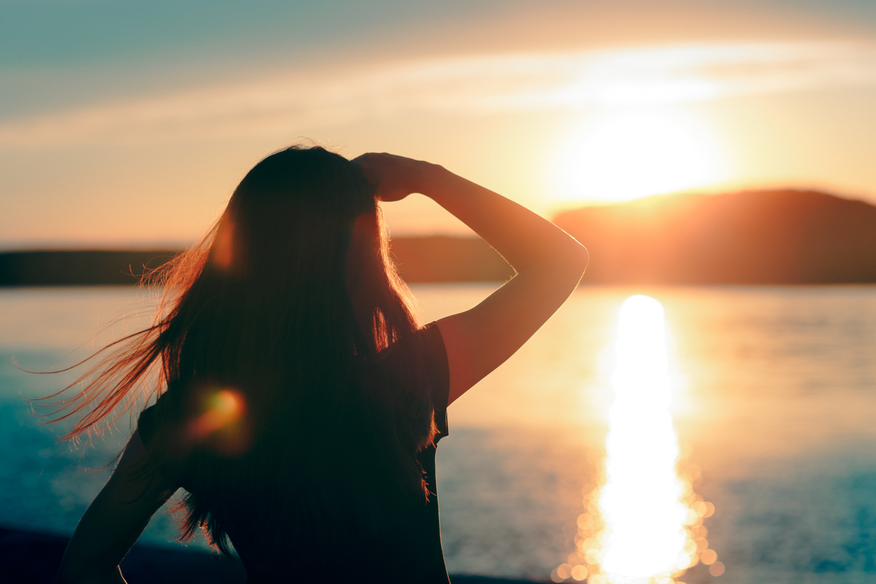 woman gazing at the sun