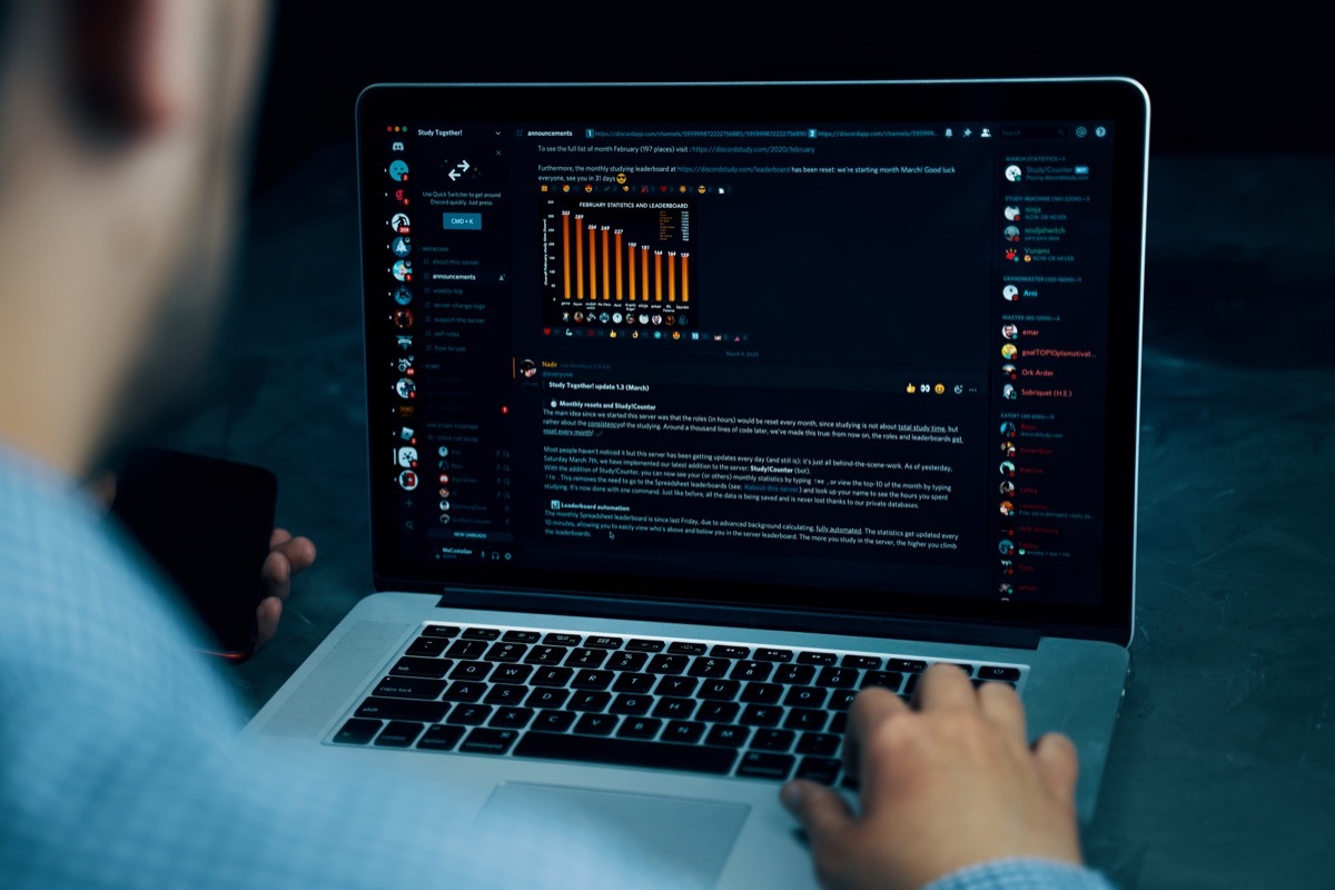 man on a computer creating a Discord name for his account