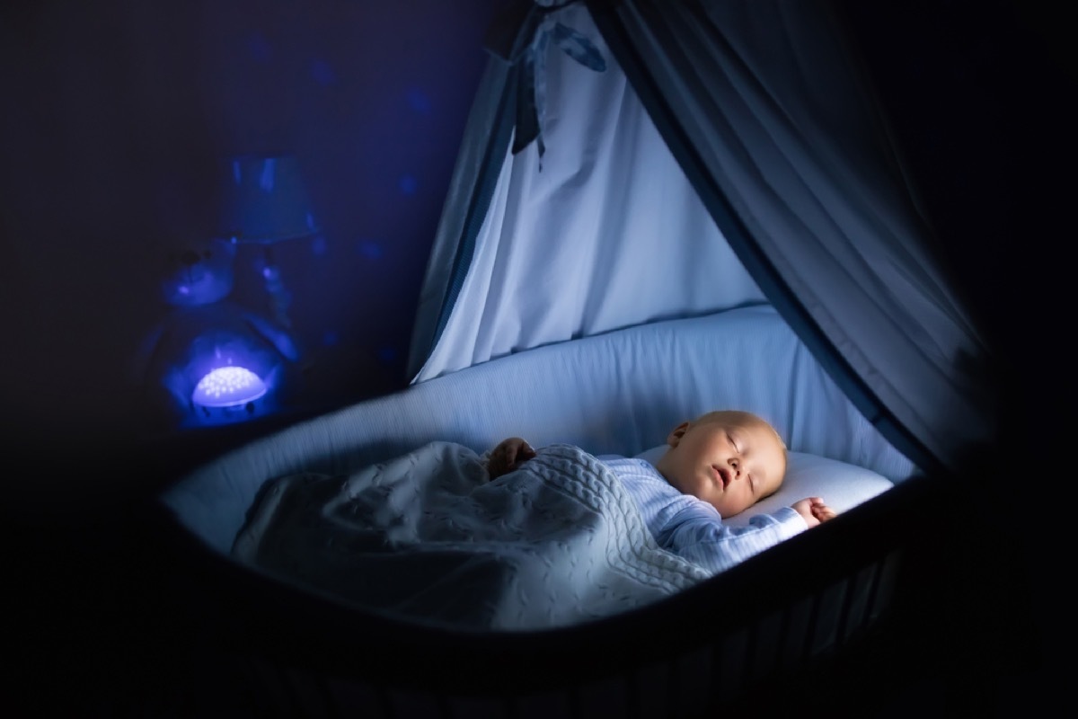 baby sleeping in nursery at night, parenting tips