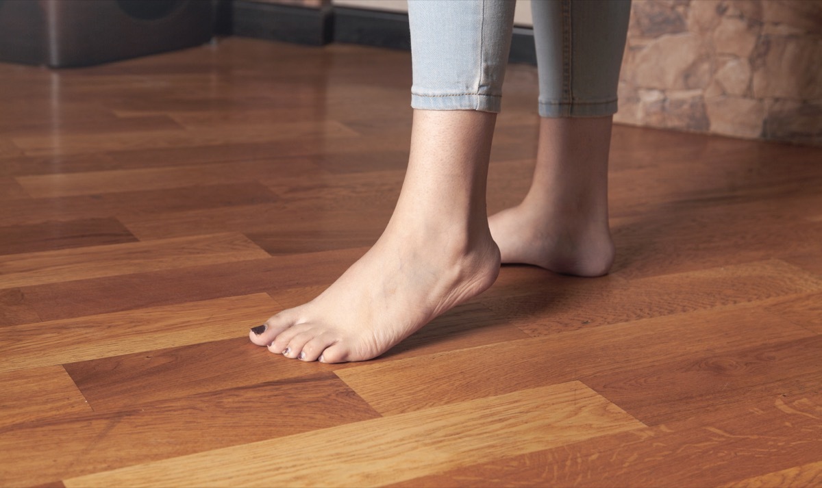 Bare feet on Hardwood Floor