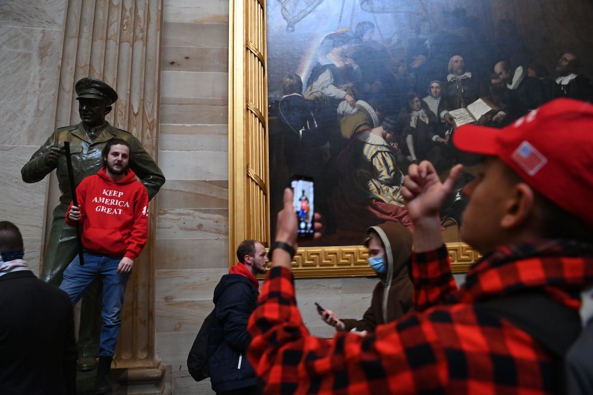 Supporters of US President Donald Trump enter the US Capitol's Rotunda on January 6, 2021, in Washington, DC. - Demonstrators breeched security and entered the Capitol as Congress debated the a 2020 presidential election Electoral Vote Certification.