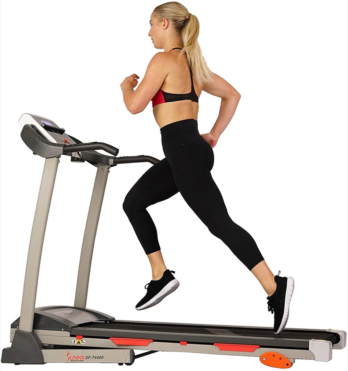 blonde woman on folding treadmill