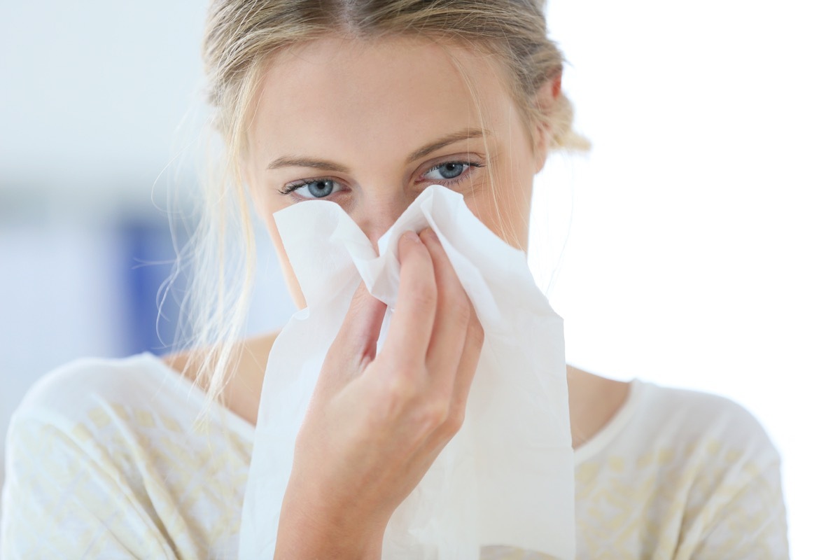 Woman with runny nose