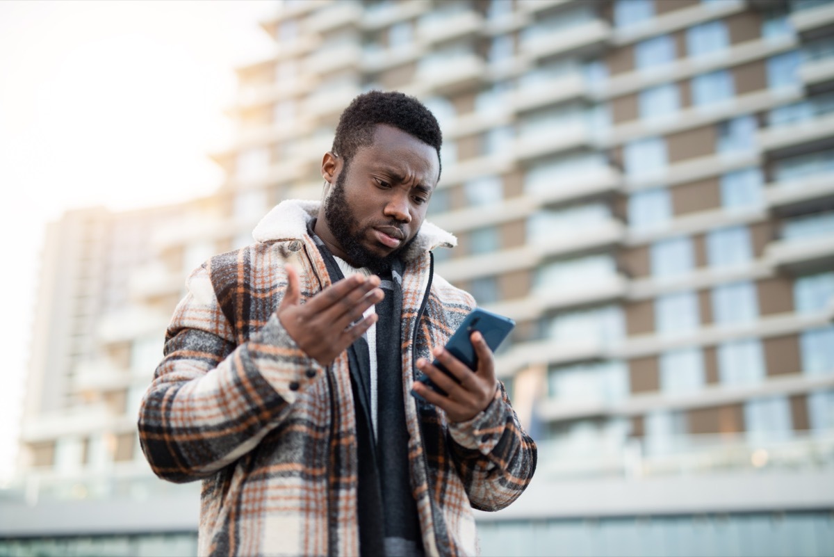 man looking at phone.