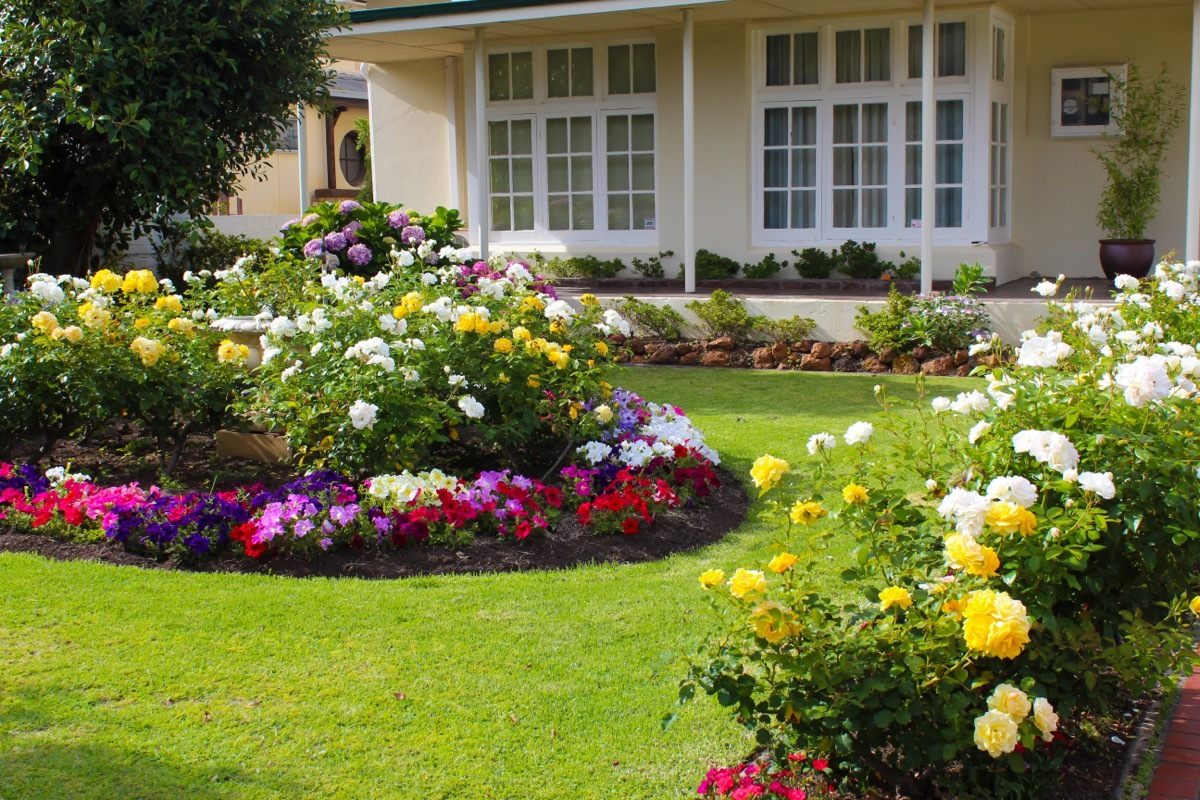 flower beds in front of home