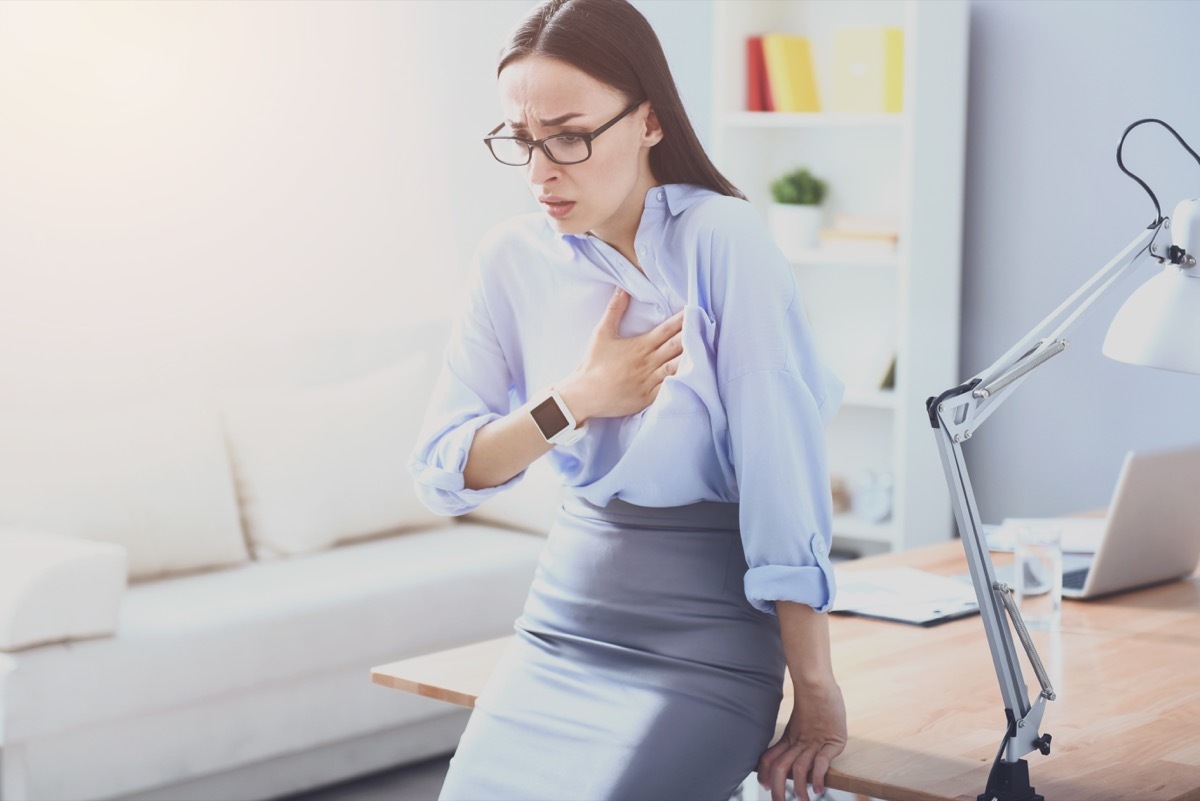 Woman nerving and leaning on the table