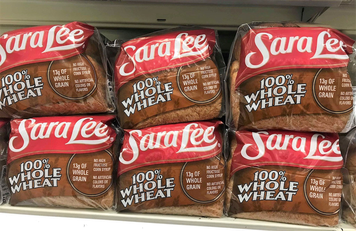 Classic 100% Whole Wheat Sara Lee Bread loaves in Supermarket 