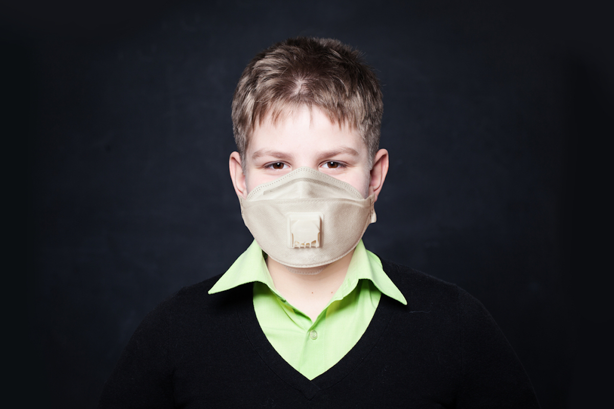 child wearing mask with respirator