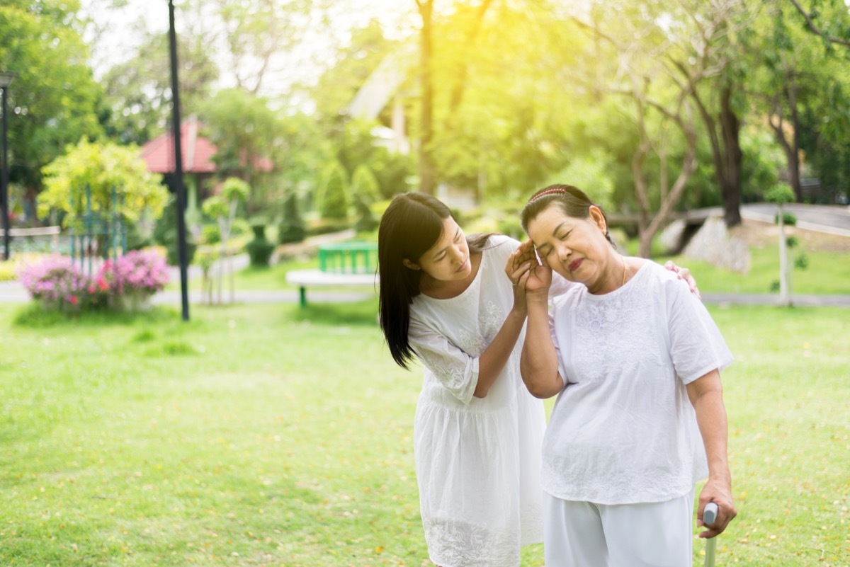 woman fainting in the park, heart warning signs