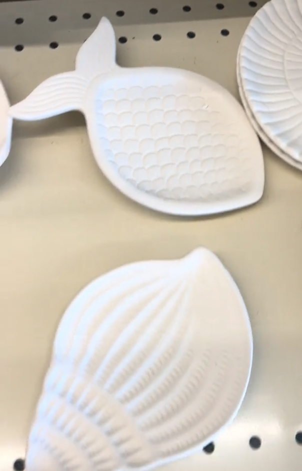 White ceramic shell and fish dishes