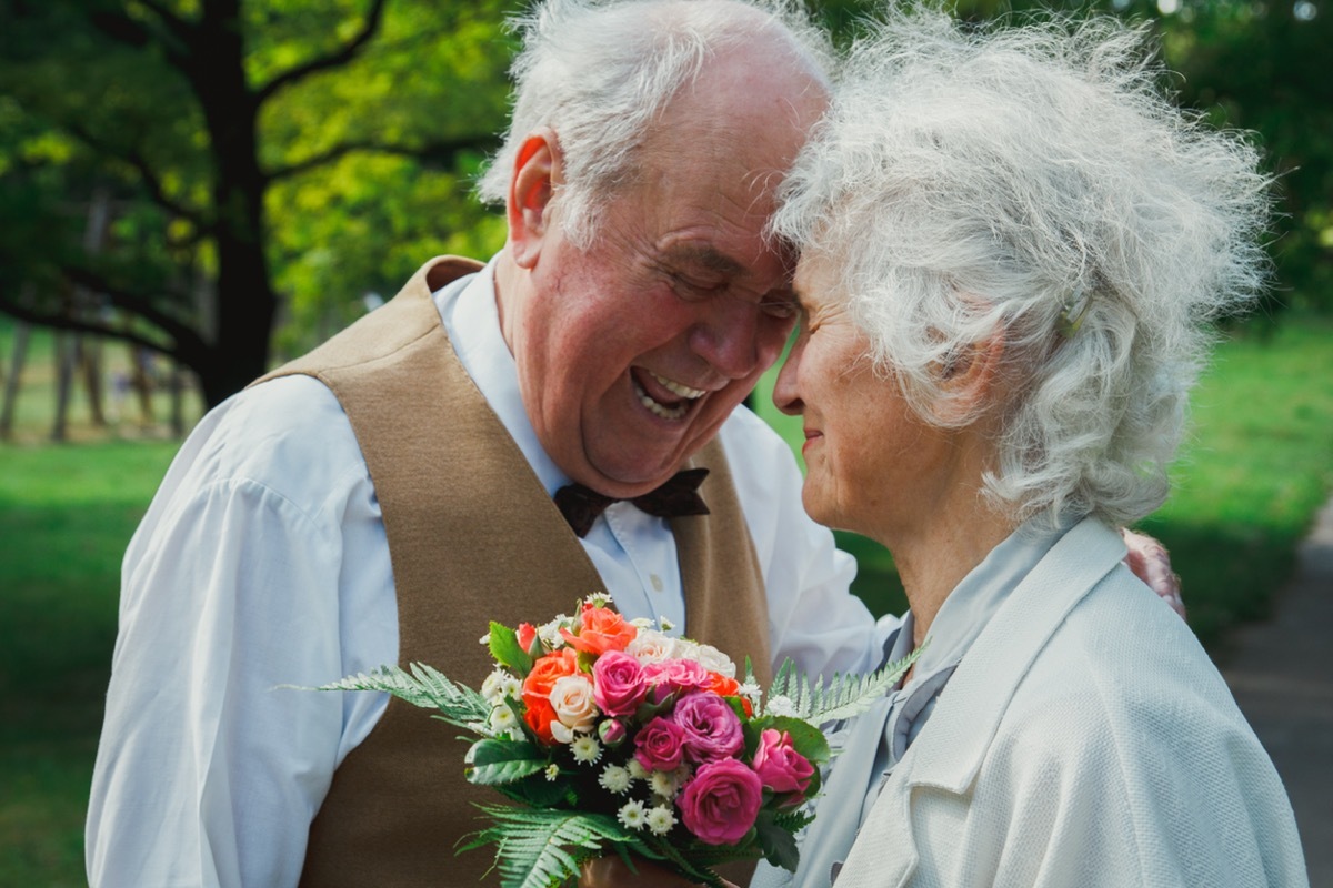 Man and woman embracing on wedding day