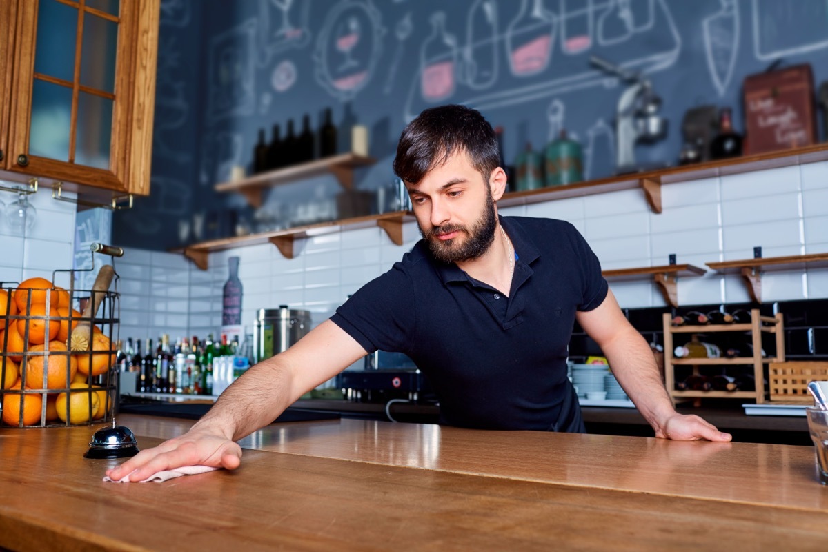 Barista Wiping Down Counter