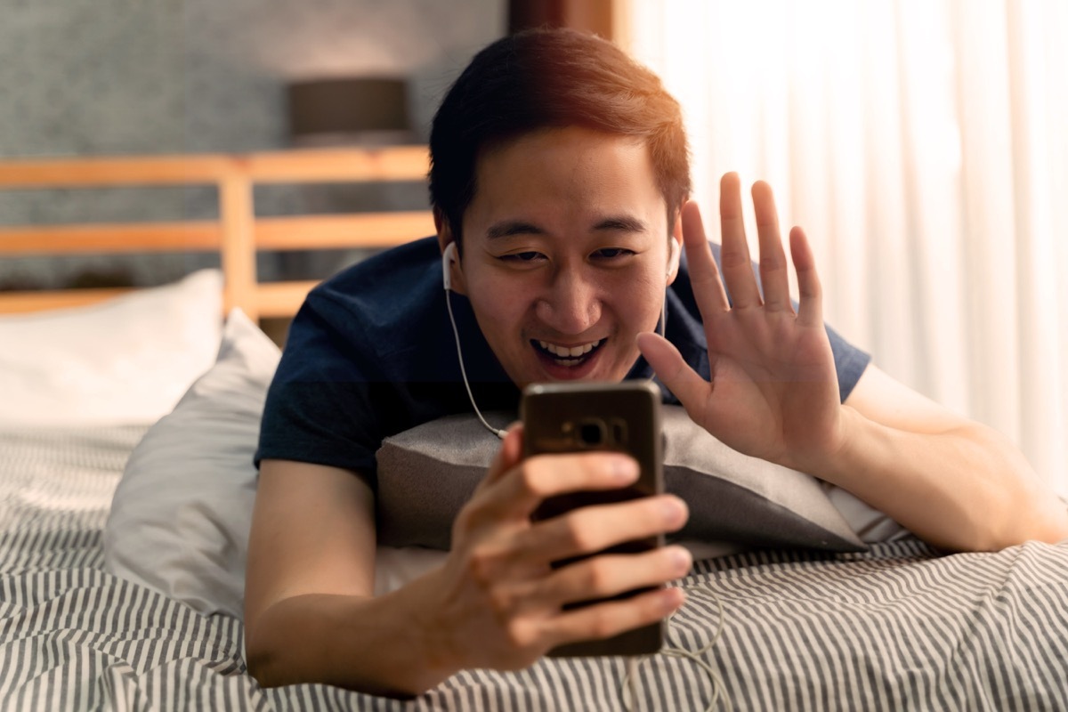 Happy man on video call