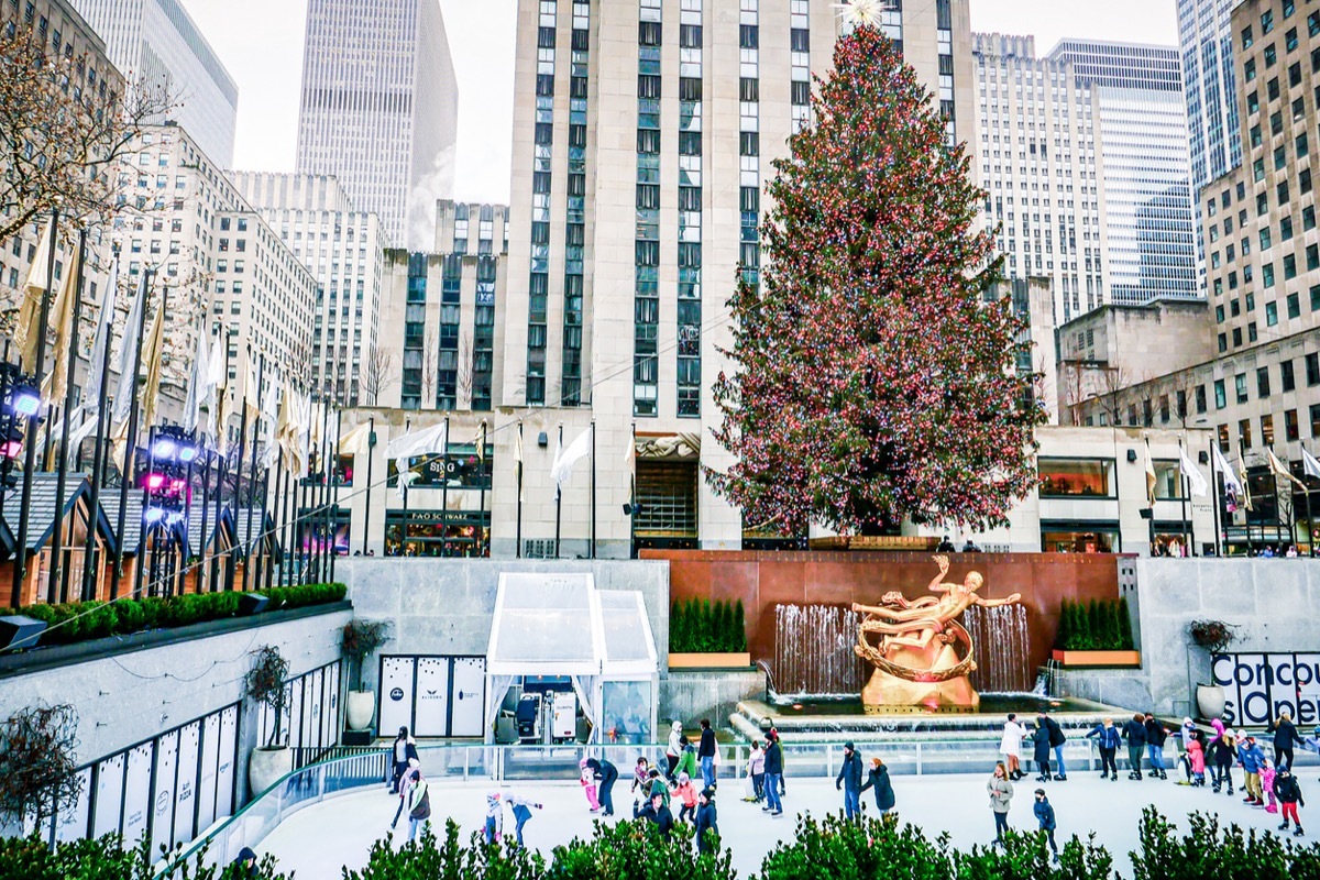 Rockefeller Tree and people ice skating underneath, in midtown New York City. Photographed on December 18, 2021