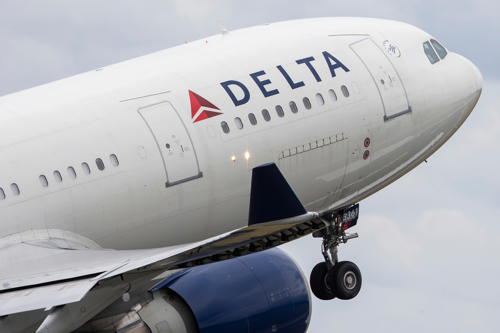 A Delta airlines plane taking off