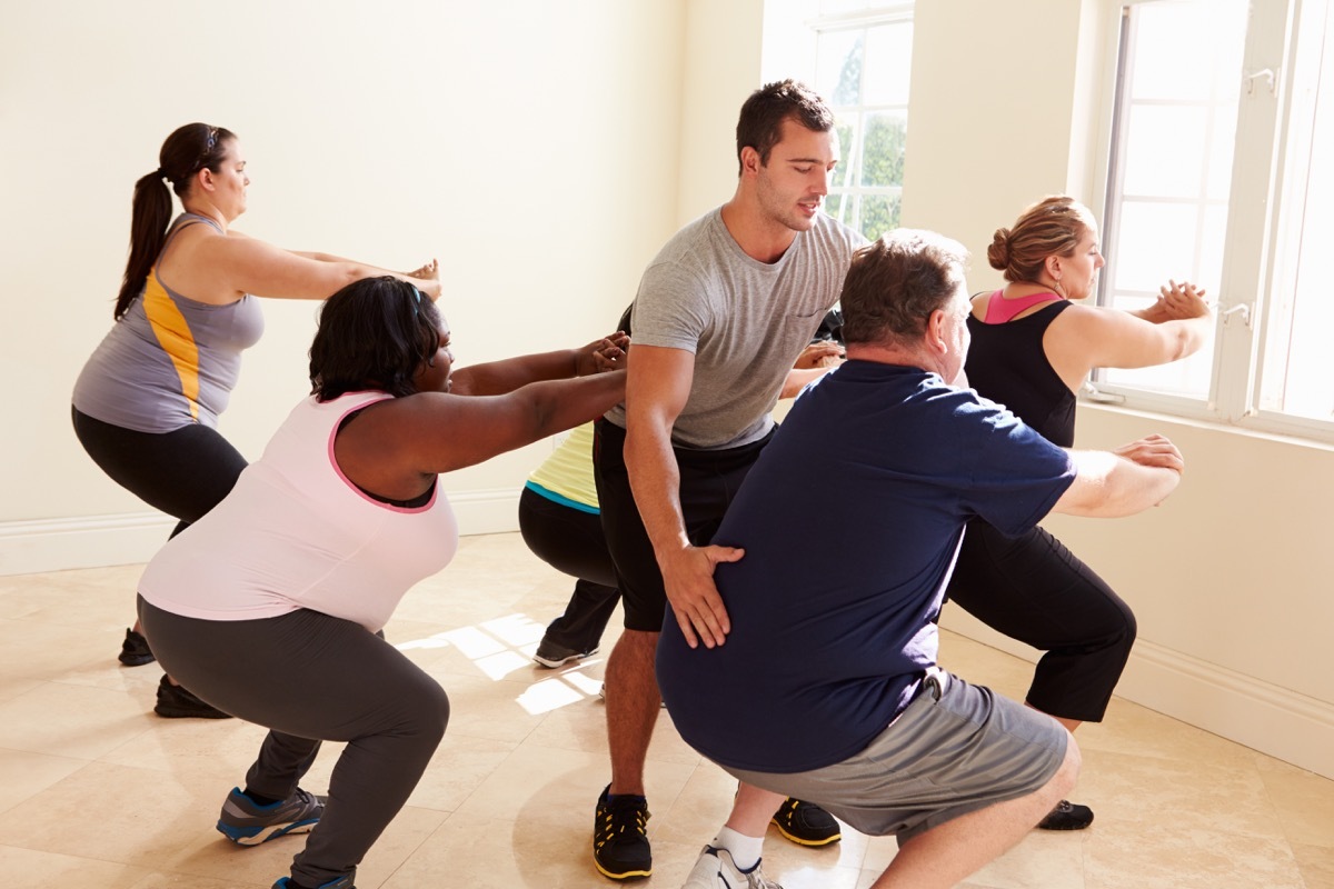 group working out and exercising, over 40 fitness