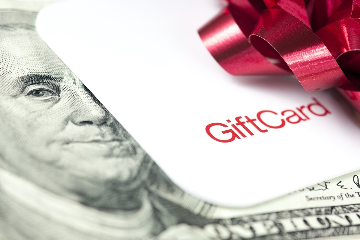 A gift card and cash. Very narrow depth of field.