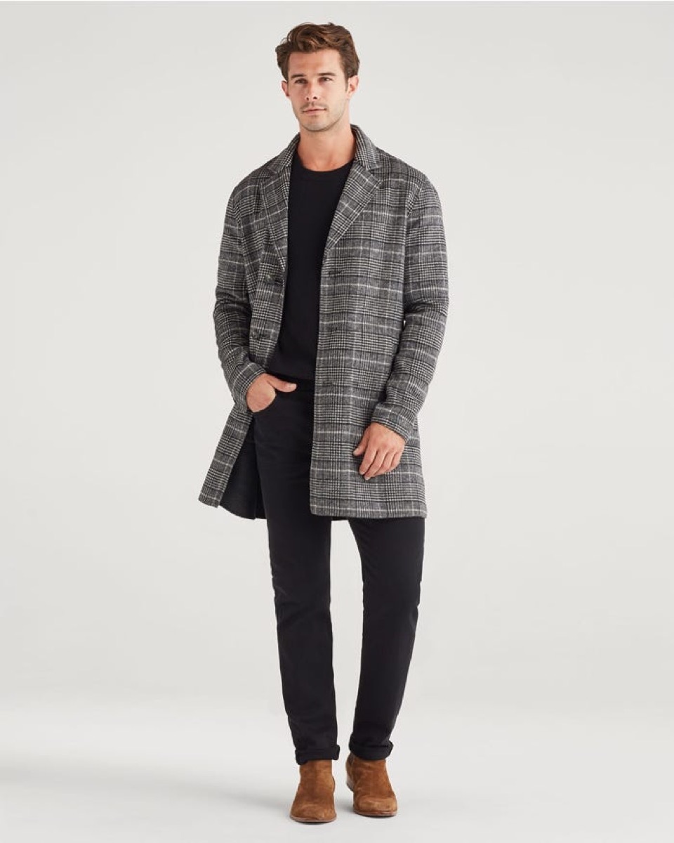 white guy in checked overcoat