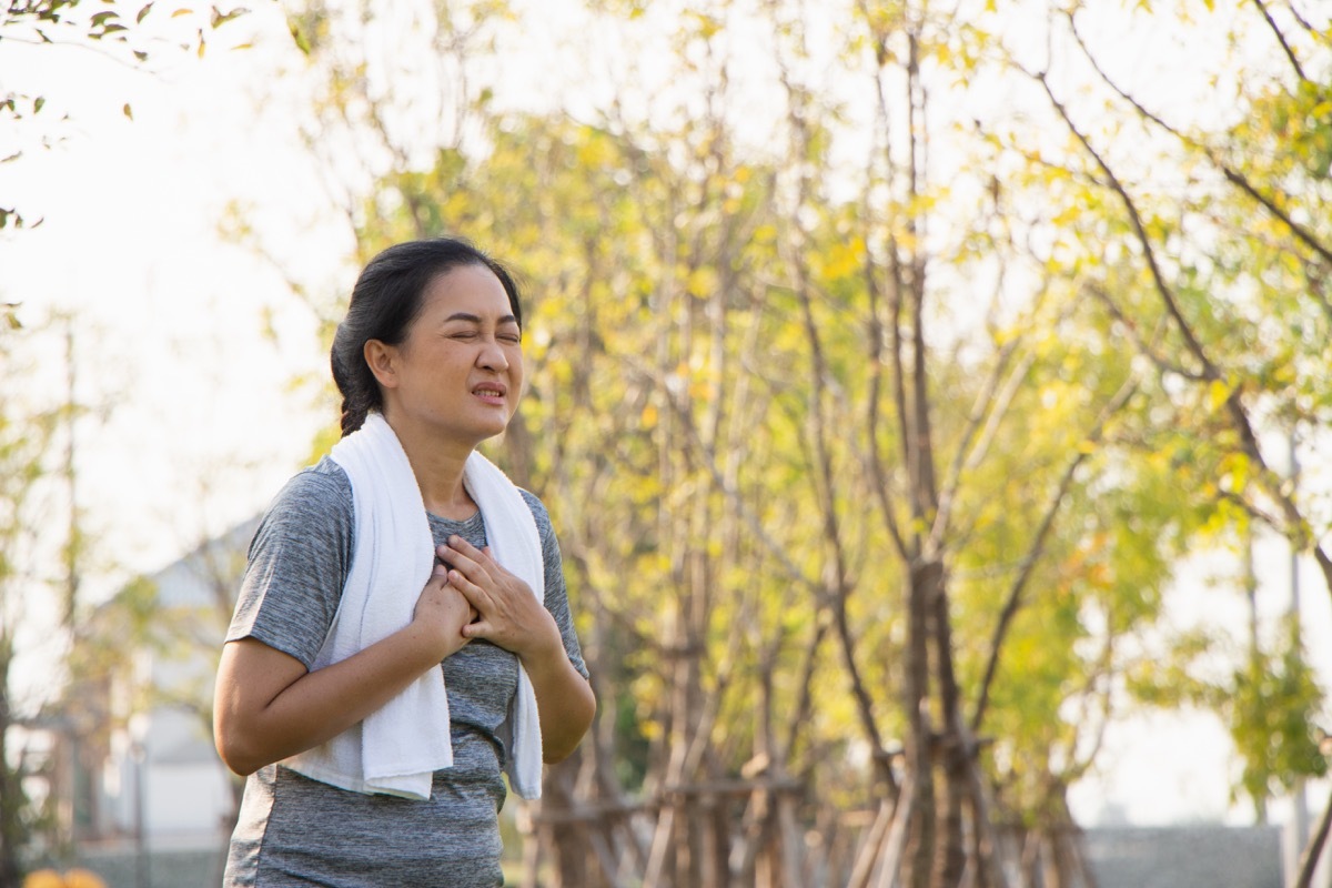 suffer from exercise pain. Senior woman having heart attack