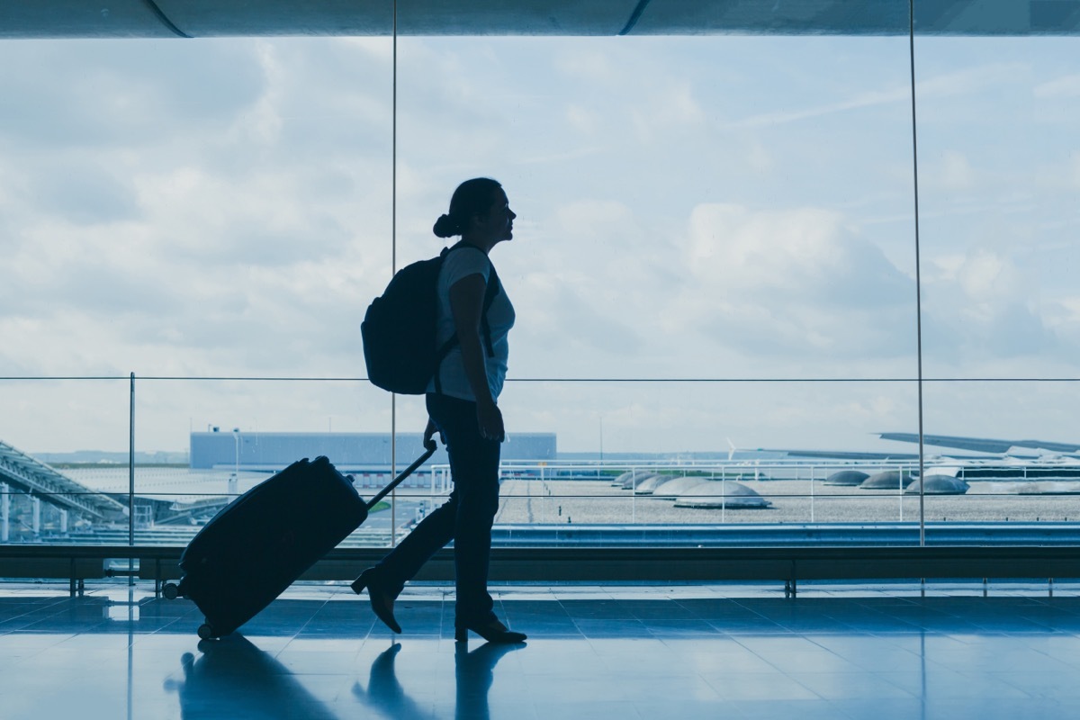 Person Walking Through Airport