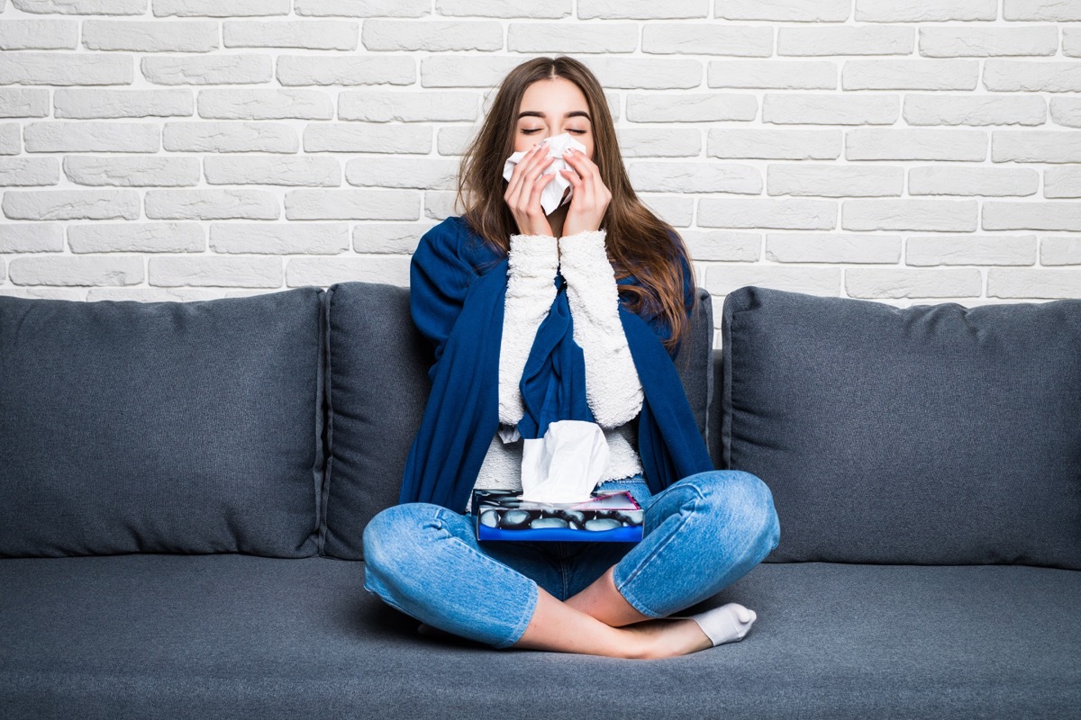 Sick woman on couch