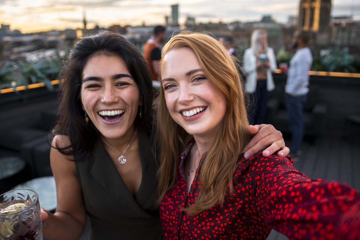 two friends laughing together