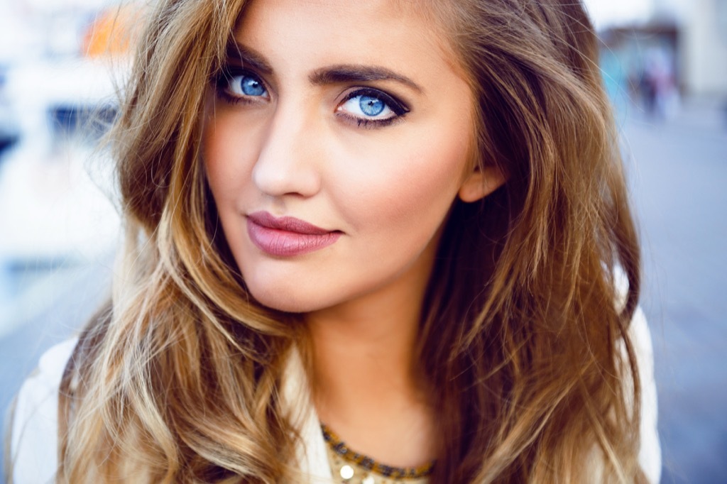 Woman with Blue Eyes Things Your Body Says About You