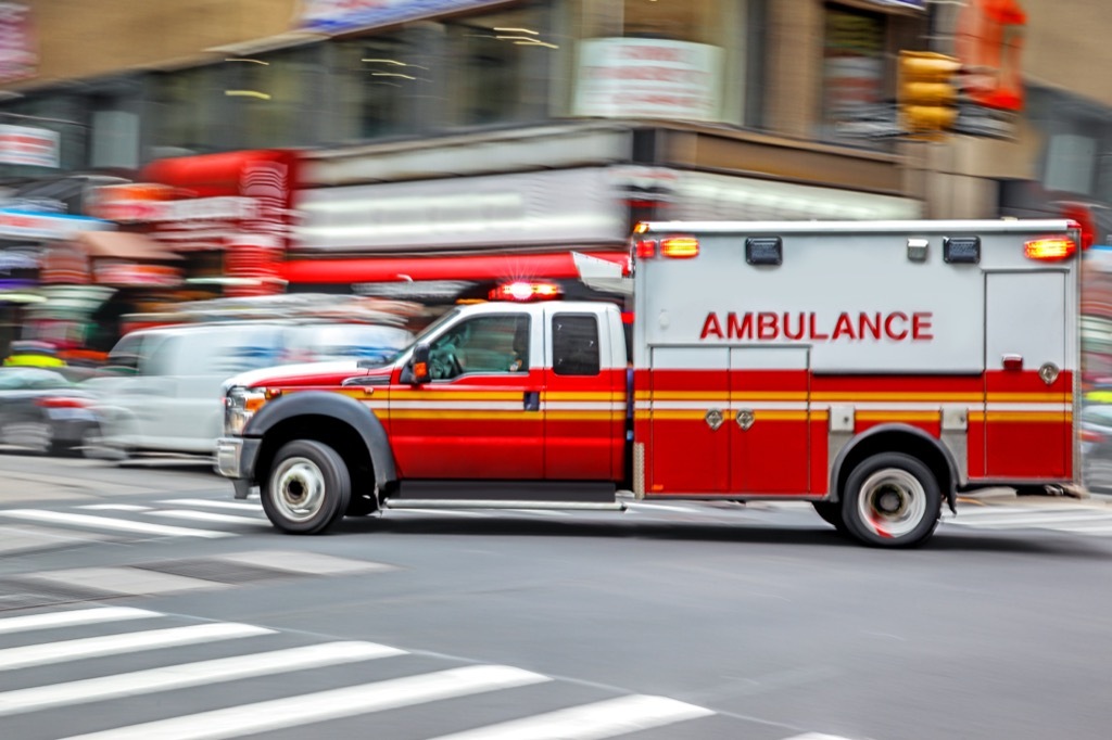 New York ambulance whizzing by on street