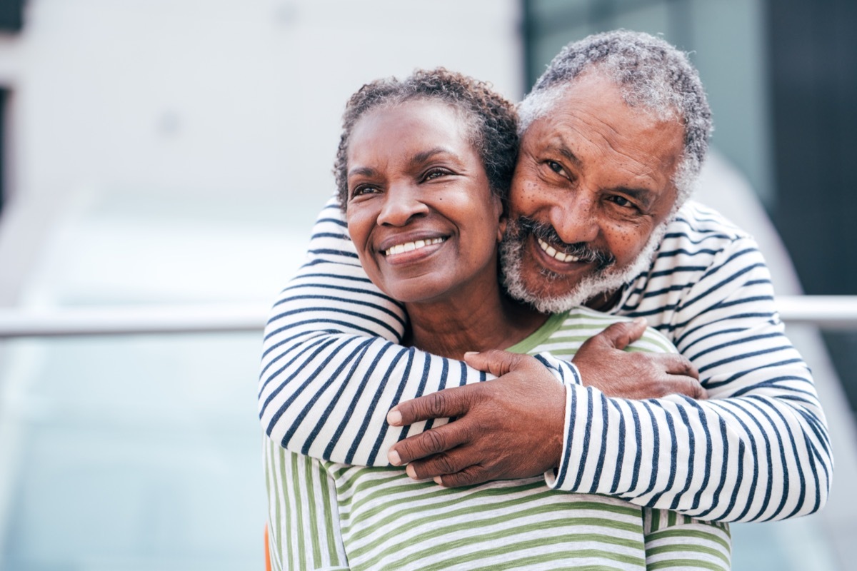 older couple hugging each other